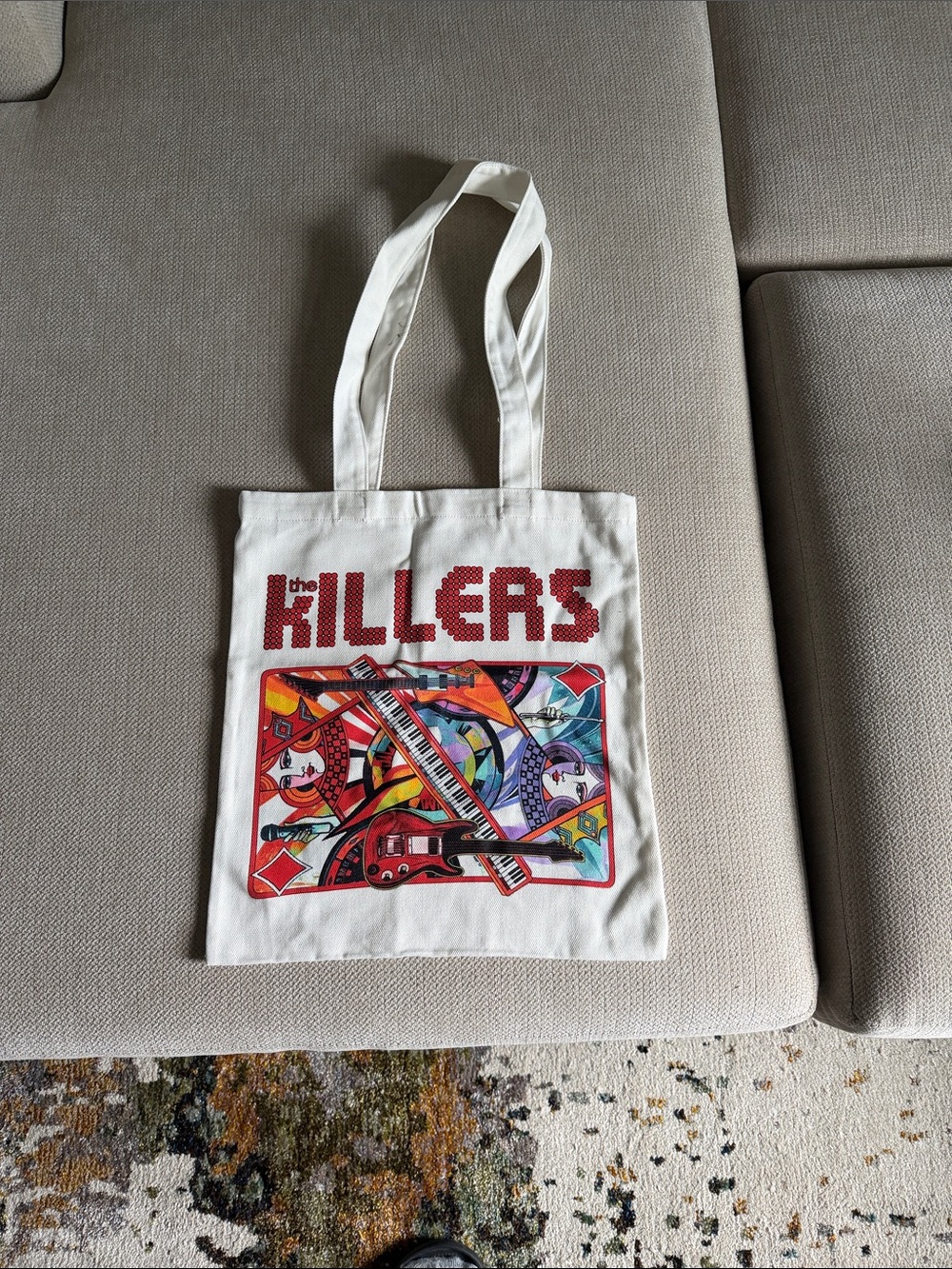 White Canvas Tote Bag with Red 'The Killers' Logo and Multicolor Graphic